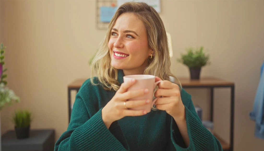 photo-of-woman-holding-a-mug-content