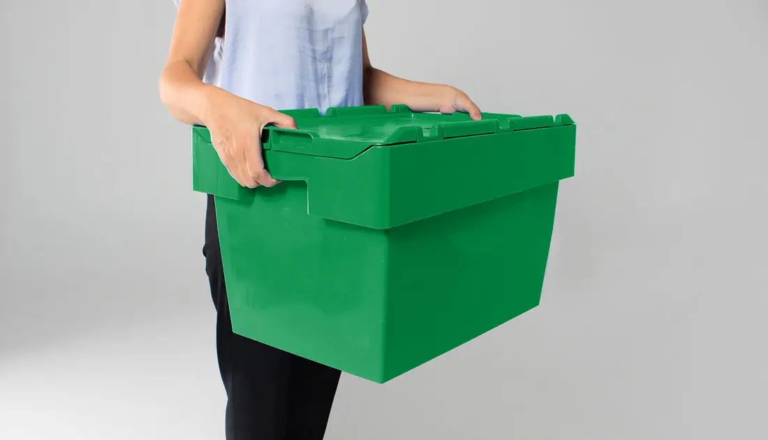 a-woman-holding-a-crate-for-self-storage
