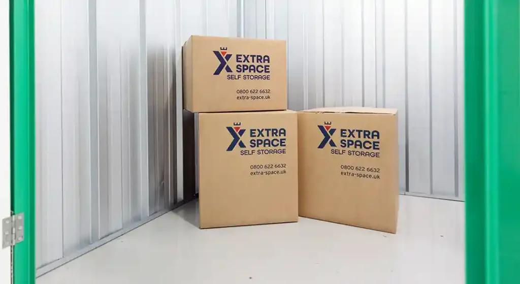 Boxes in a storage unit with the Extra Space logo